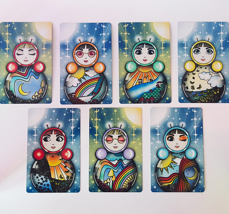 Set of seven art cards featuring O in different designs inspired by nature, light, and emotion.