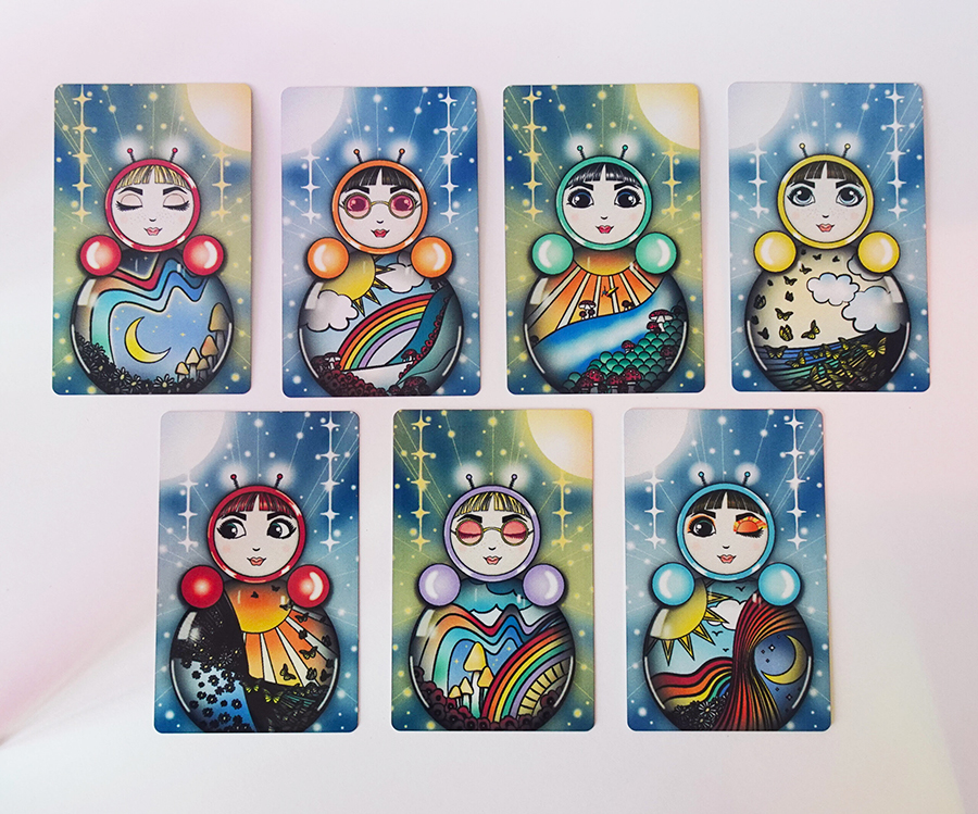 Set of seven art cards featuring O in different designs inspired by nature, light, and emotion.